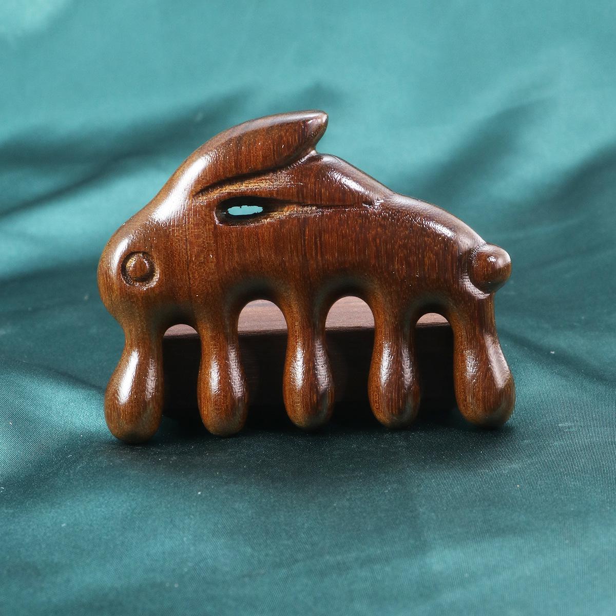 

**Golden Sandalwood Jade Rabbit Five-Tooth Wooden Massage Comb**