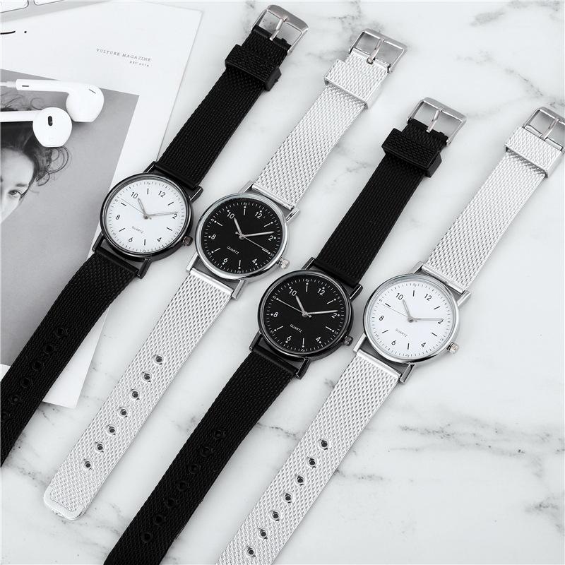 Modische leuchtende Uhr Damen-Kleber-Netzarmband Quarz-Uhr Damen-Uhr Nischen-Damen-Uhr