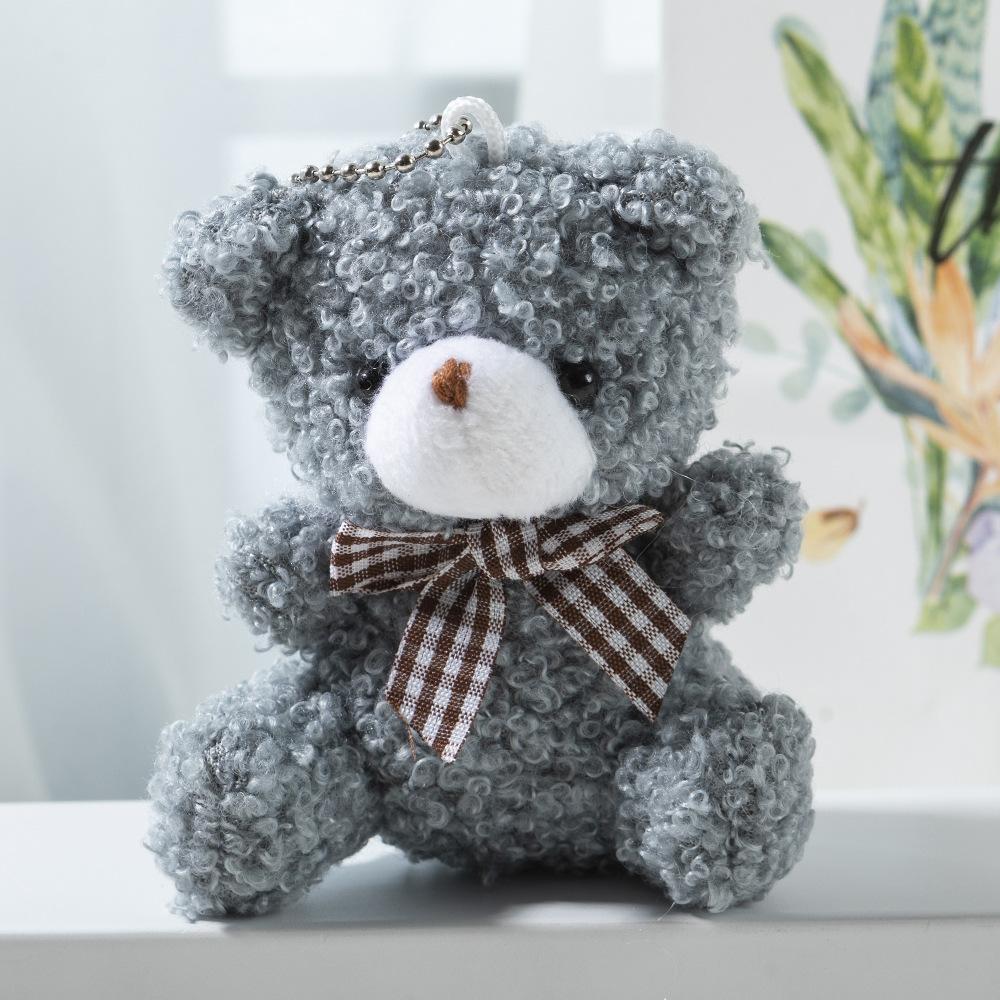 Niedliche Cartoon Mini-Fliege Teddybär Kurzes Plüschtier Tasche Auto Schlüsselanhänger Anhänger Puppe
