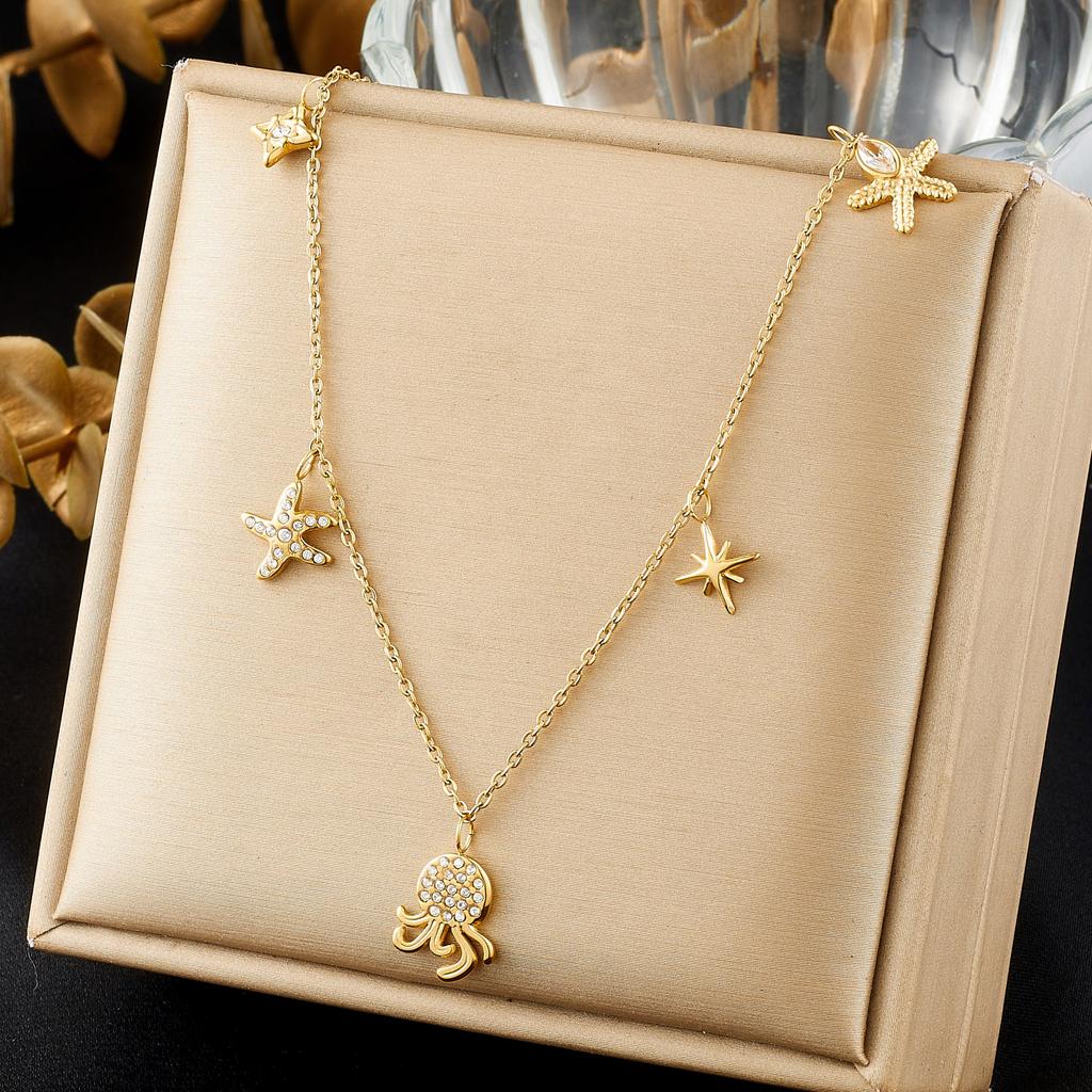 DIEYURO 316L Stainless Steel Golden Octopus Starfish Inlay Zircon Star Pendant Necklace for Women Ocean Neck Chain Jewelry Gift