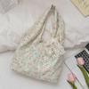Korean Niche Hollow Broken Flower Canvas Bag Women's New Largecapacity Commuter Underarm Bag Shoulder Bag