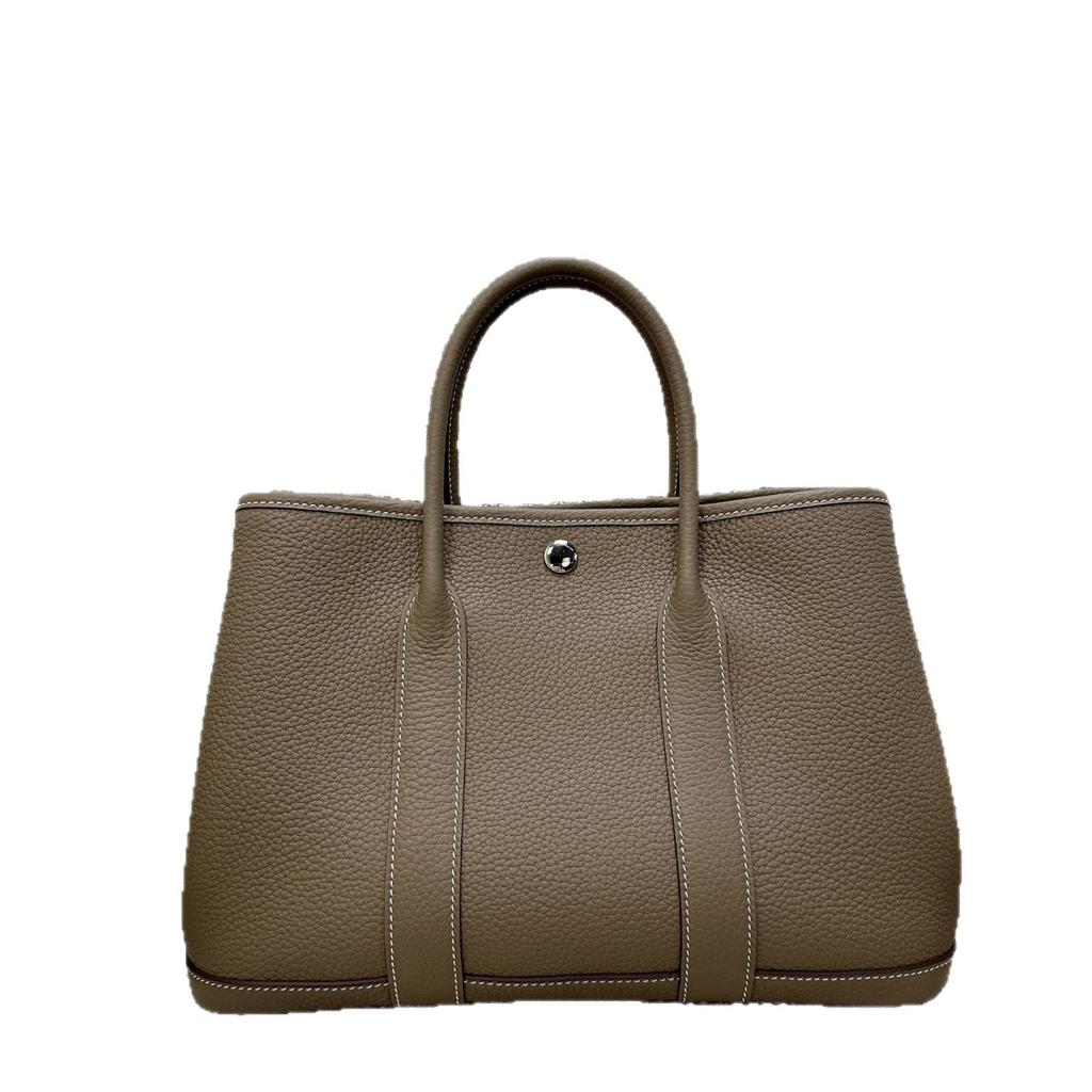 Borsa da giardino cucita a mano con filo cerato, ferramenta interamente in acciaio, borsa da donna portatile in pelle bovina primo strato con motivo a collo di mucca Ntogo