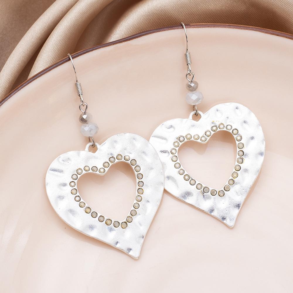 

Ретро Легкая Роскошь Серьги-Сердечки со Стразами для Женщин - Цинковый Сплав с Полым Дизайном серебряный песка