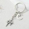 Elegant Star and Moon Hollow Keychain - Unisex Fashion Bag Pendant.