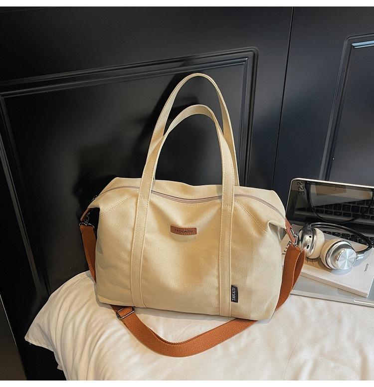 

Casual simple handbag bag women s 2025 new Korean version large-capacity tote bag niche commuter shoulder messenger bag хакі