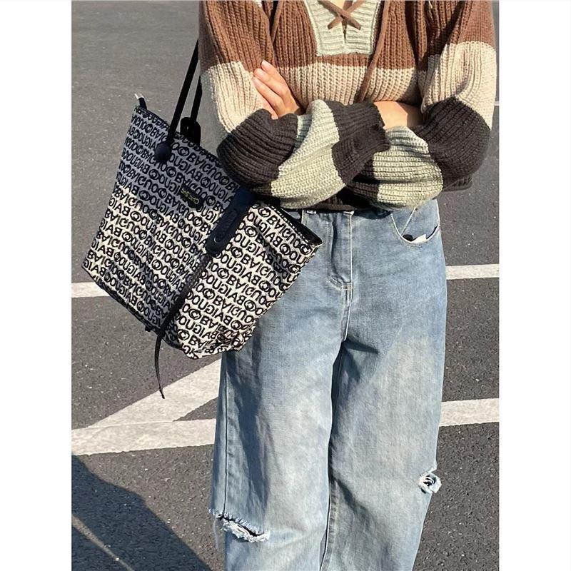 

2024 Новая сумка-тоут Rumba Notes Весенняя и летняя женская сумка большой вместимости Premium Sense Commuter Универсальная большая сумка через плечо чёрный