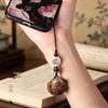 Green Sandalwood Sachet Ball: Ancient-Style Aromatherapy Pendant & Mobile Phone Lanyard with Opening Feature.