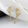Elegant 18K Gold Stud Earrings with Modern Luxury Design