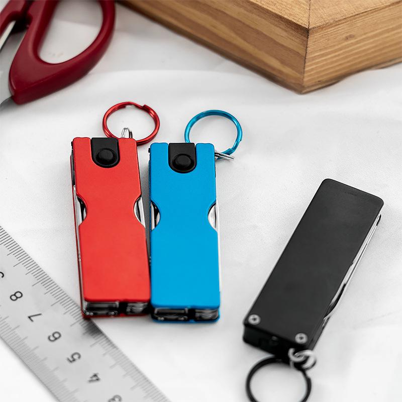 Popular Mini Multifunction Nail Beauty Tool: Folding Knife with LED, Scissors, and Clippers