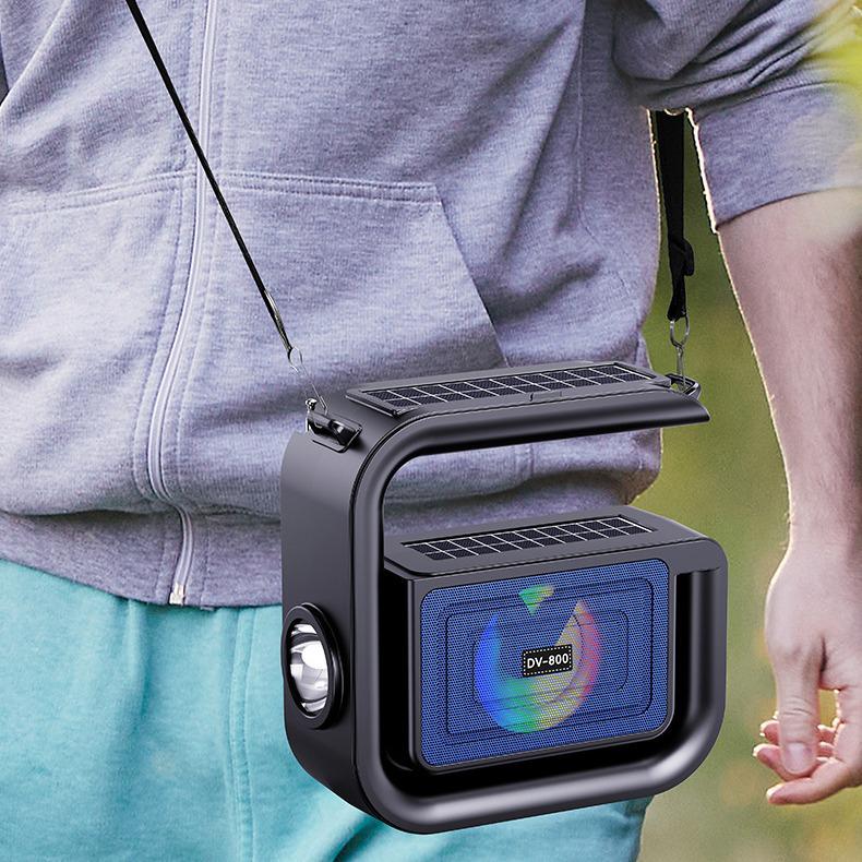 Solar-Powered Bluetooth Speaker with Bass, Flashlight, and Phone Holder for Outdoor Use