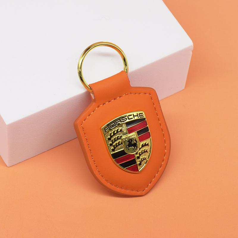 

Шкіряний брелок для ключів автомобіля Тип Щит 3D Емблема Кільце для ключів Для Porsche Panamera Cayenne Taycan 911 718 Macan Carrera-GT 928 944 968 944