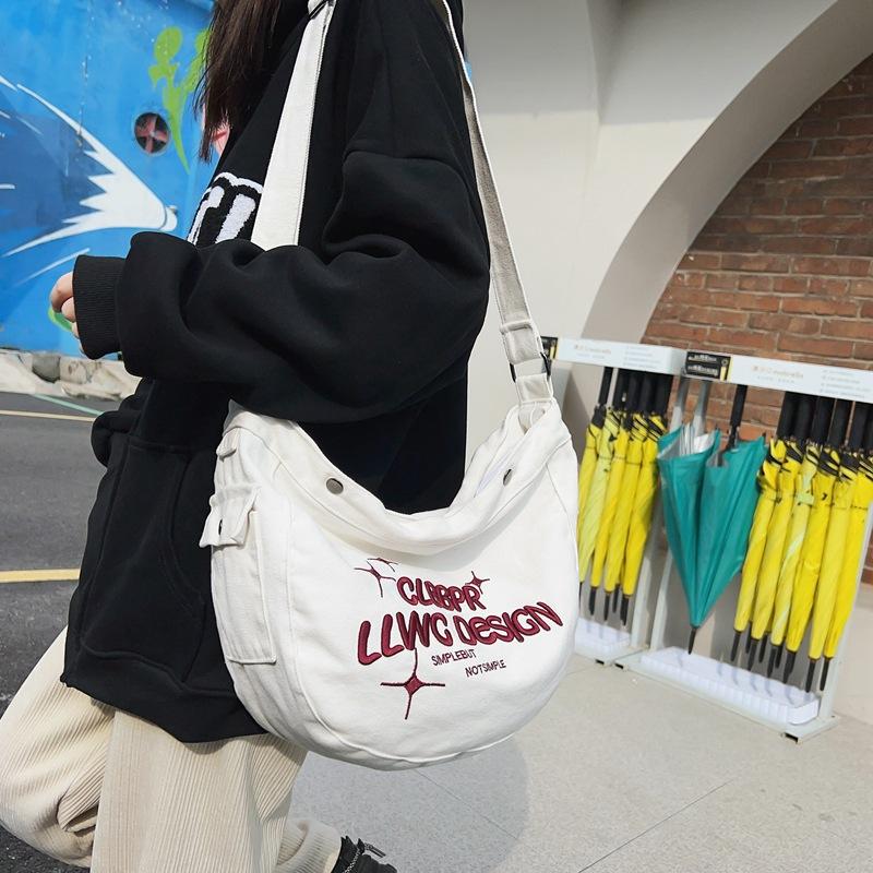 Canvas bag female college student class ins lazy wind large capacity shoulder messenger bag niche letter dumpling bag
