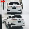 BMW IX Carbon Fiber Body Kit: FD Style Front Lip, Side Skirts, Rear Lip, Rear Bumper Corners, Roof Spoiler.