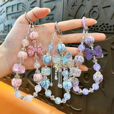  Charm de téléphone élégant avec pompon papillon perlé, porte-clés accessoire