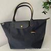 Embroidered Spliced Dumpling Tote Bag – Large Capacity Commuter Handbag