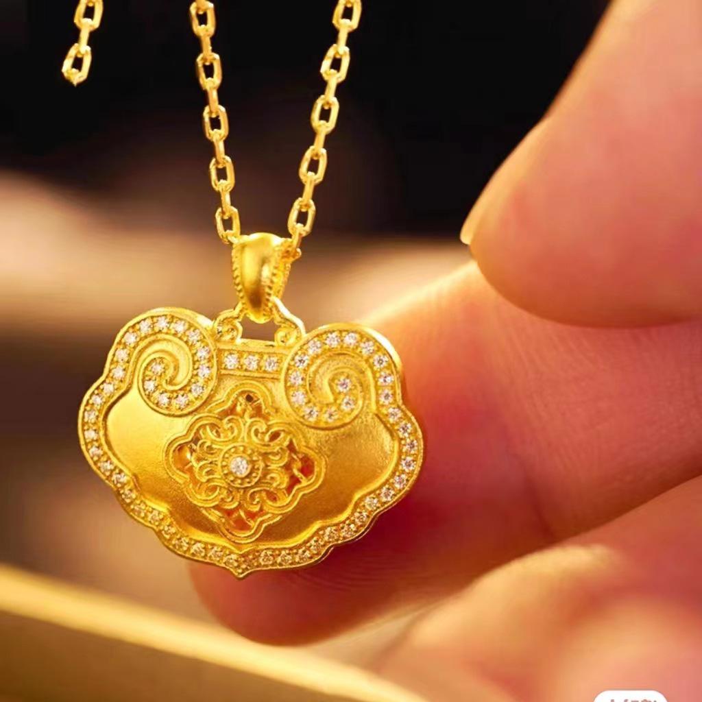 

Gold-Plated Longevity Lock Pendant with Filigree Design