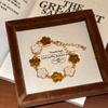 Minimalist Flower Pendant Bracelet: Stylish, Luxurious, and Versatile Bangle Design