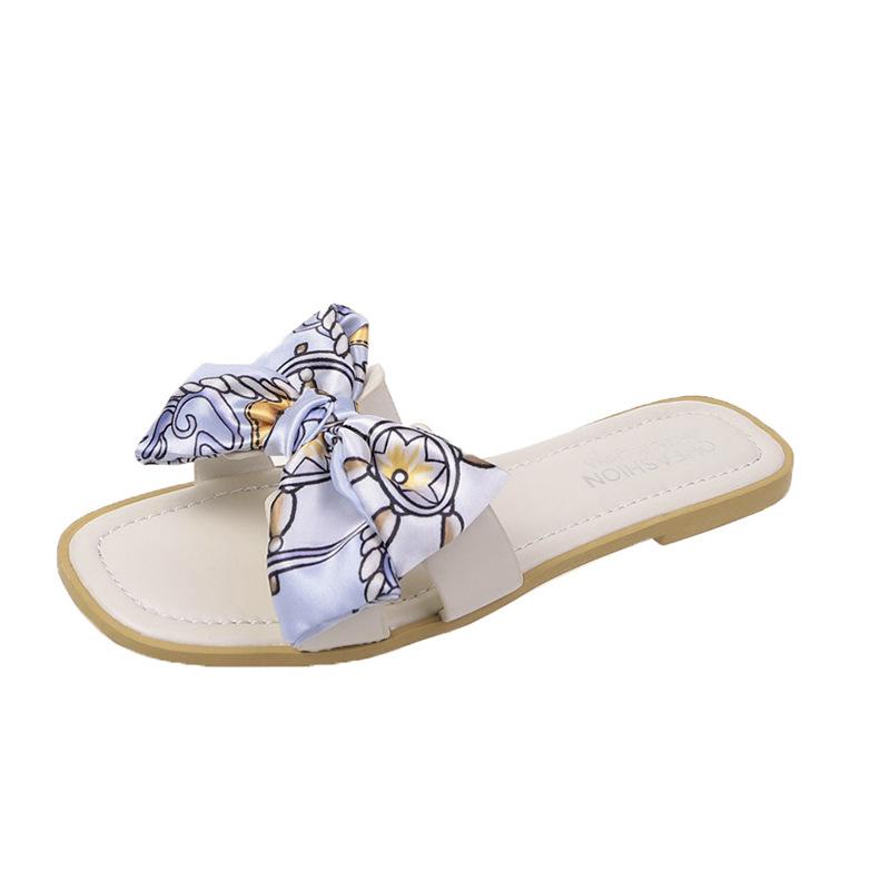 Bow slippers women's outer wear 2024 summer new flat-bottomed fashion fairy wind large size one-word cool slippers women's shoes