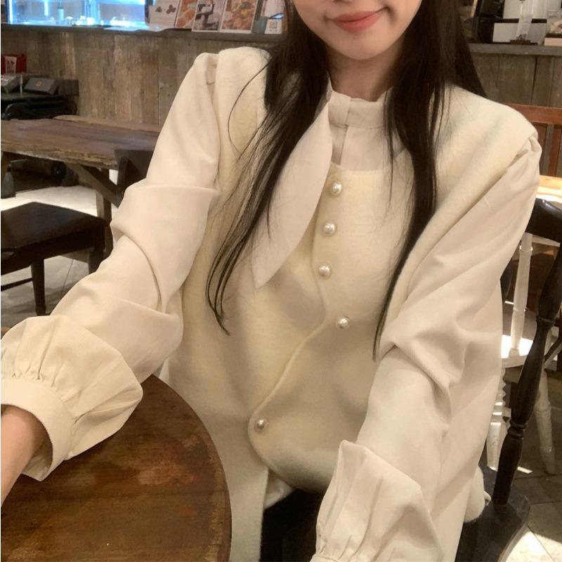 Designed irregular button sweater vest women's winter sleeveless layered solid color sweater vest top