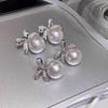 Butterfly Pearl Stud Earrings Women's Light Luxury Niche Design High-end Ear Clips Without Ear Piercings Temperament Earrings Tide