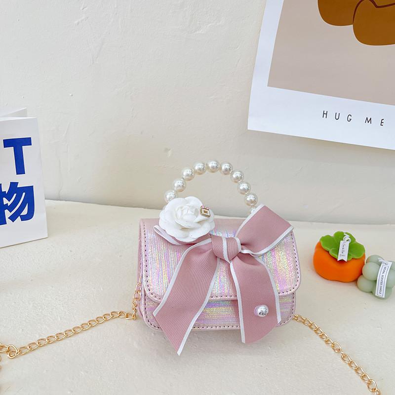 

Стильна корейська міні дитяча сумка через плече з чарівним перловим ланцюжком для дівчаток рожевий