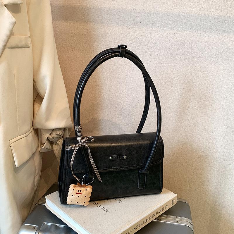 

Temperament bag women s 2025 autumn new Korean version trendy one shoulder foreign style design baguette underarm bag small briefcase no pendant