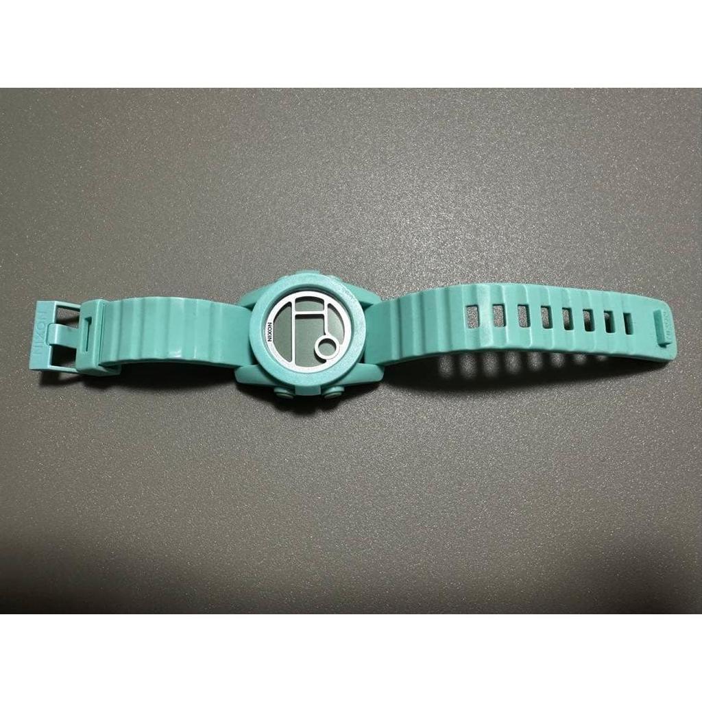 Used Nixon wristwatch, dead battery, black, no parts removed after belt adjustment