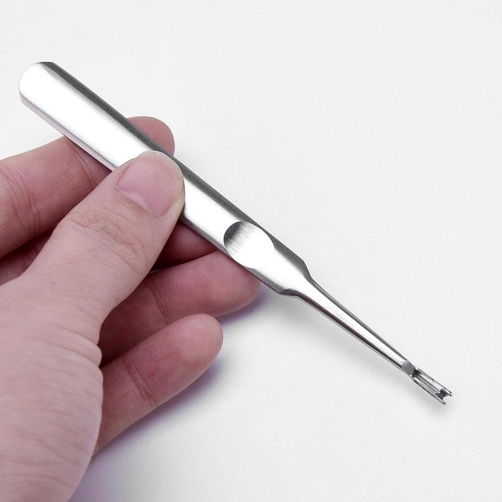 V-förmiger Hornhautentferner aus Edelstahl & Maniküre-Schieber