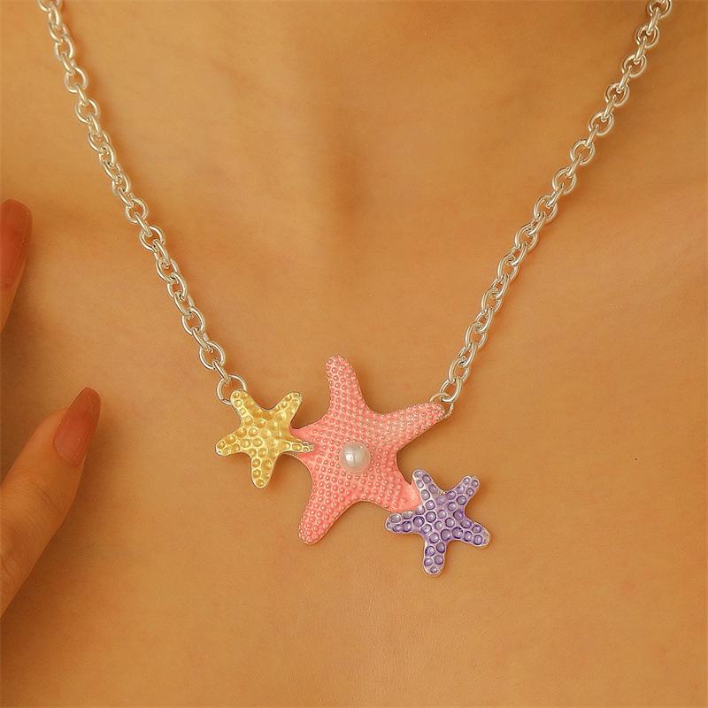 European and American star shell long necklace women's versatile high-end sense inlaid pearl drip oil collarbone chain necklace