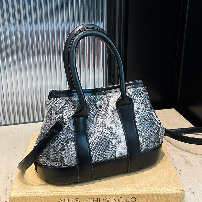 Wholesale New Product Personality Niche Design Snake Pattern Portable Bucket Bag Fashion High-end Temperament Versatile Messenger Women's Bag