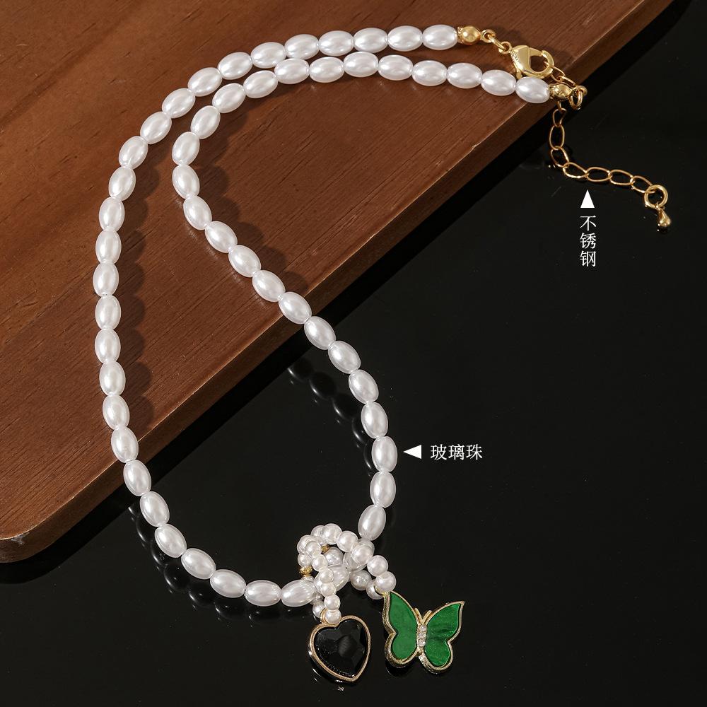 Retro Sweet and Cool Green Butterfly Love Shijia Pearl Necklace Rice-shaped Glass Imitation Pearl Stainless Steel Short Collarbone Chain