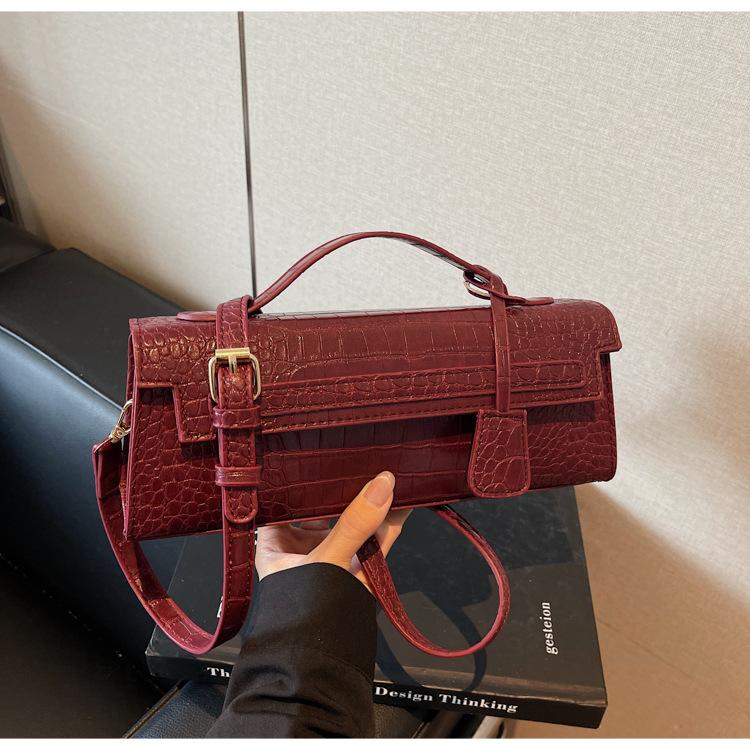 Heiß verkaufte Mode Baguette-Tasche neue Frühling und Sommer Clutch mit hoher Textur Einzelne Schulter Schräg getragene Tasche Damen
