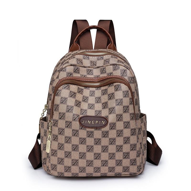 

Рюкзак з принтом. Жіночий рюкзак у шашку. Дорожній рюкзак великої місткості хакі