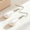 Waterdrop Pearl Earrings for Women: Elegant French Retro No-Pierce Ear Clips, Stylish & Versatile.