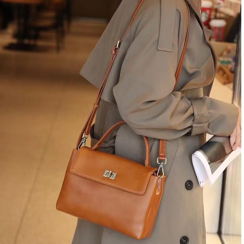 Nischendesign Damen Tasche Frühling und Sommer Neu Vielseitige Lederhandtasche Große Kapazität Doppellagige Tasche Schultertasche