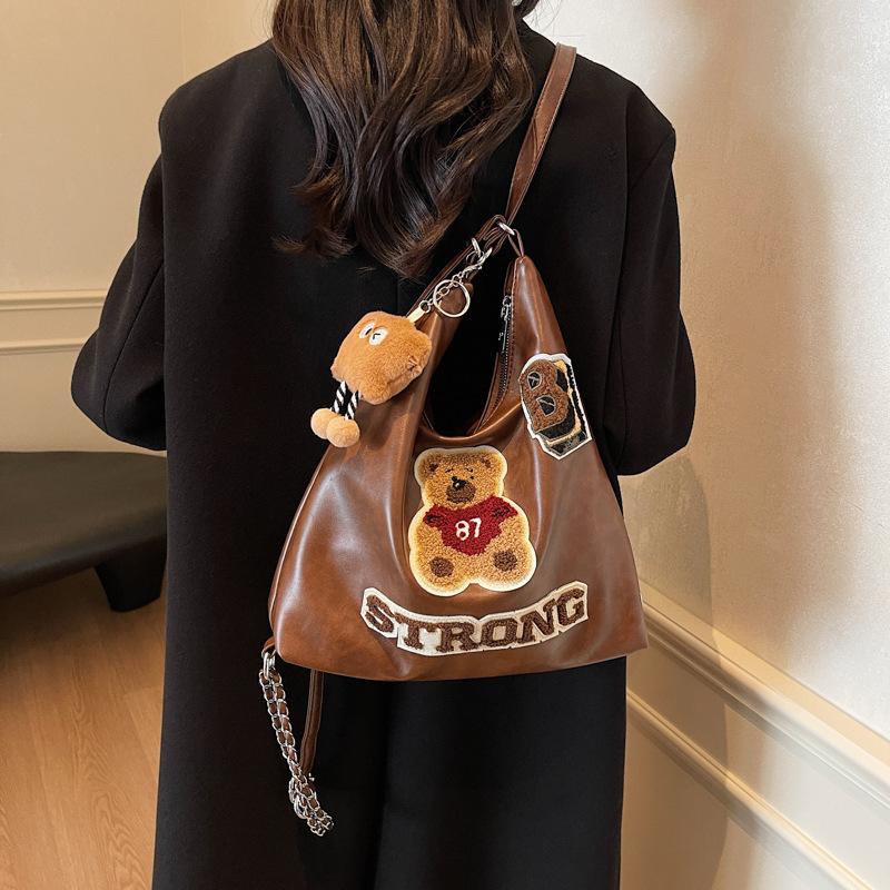 Fashion and leisure large-capacity backpack women's 2025 new spring and summer cartoon embroidery high-end niche design