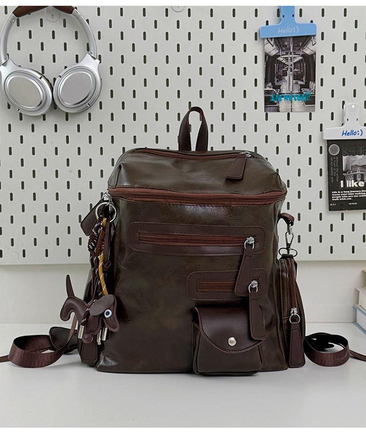 Schoolbag European and American retro silver nail-trimmed backpack couple high street locomotive wind light and versatile class storage backpack