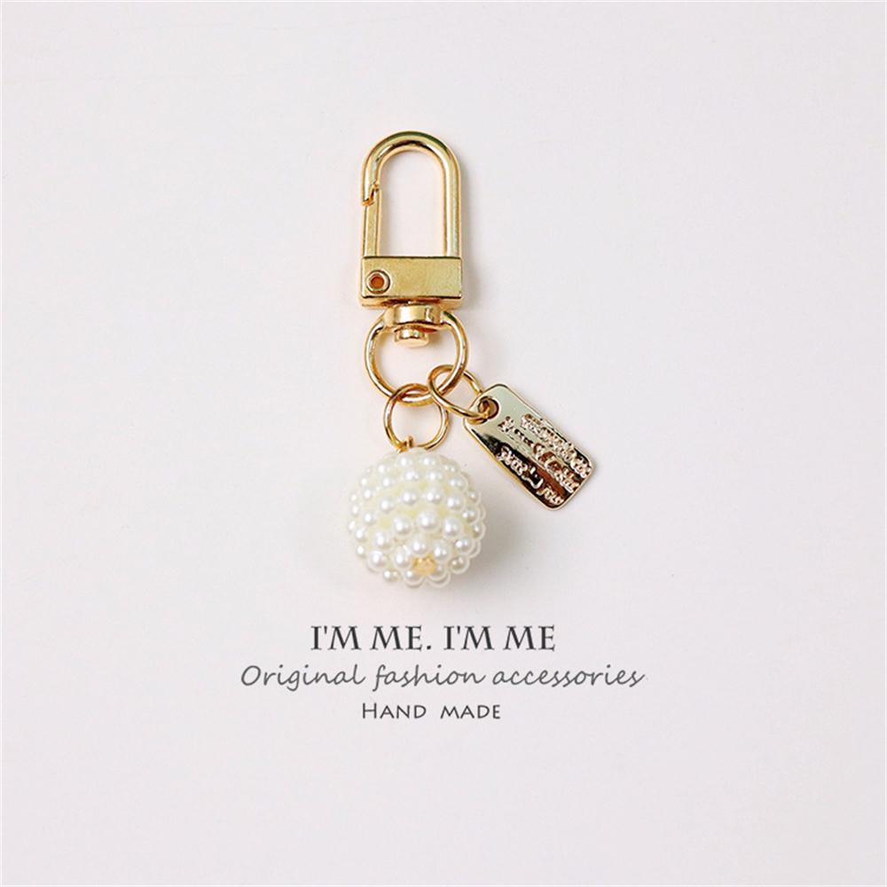 Niedlicher Perlenblumen-Schlüsselanhänger Glänzendes Muschelblatt-Schlüsselanhänger Metallanhänger Zubehör für Damen Auto Anhänger Taschenanhänger Schmuck