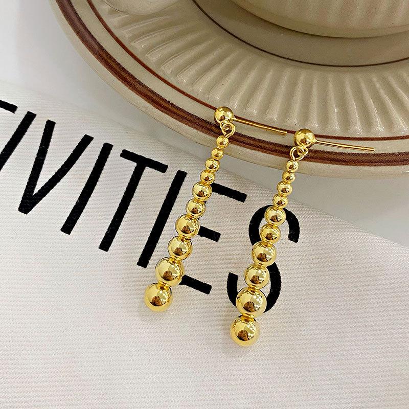 

Длинные серьги-бусины, индивидуальный длинный стиль, который сделает ваше лицо худым, и высококачественные серьги нишевого дизайна для женщин