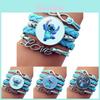 Trendiges blaues Lederarmband mit Nähten und handgefertigtem geometrischem Cartoon-Design