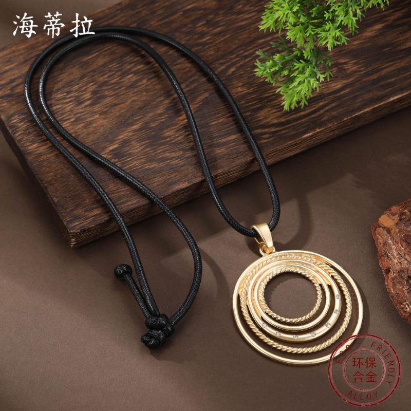 New dumb gold hollow disc leather rope long pendant, women's creative exaggerated geometric ring long necklace
