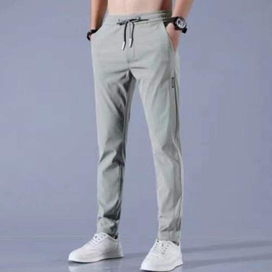 Men Pants Solid Color Drawstring Mid Waist Pockets Loose Streetwear Straight Working Trousers for Daily Wear