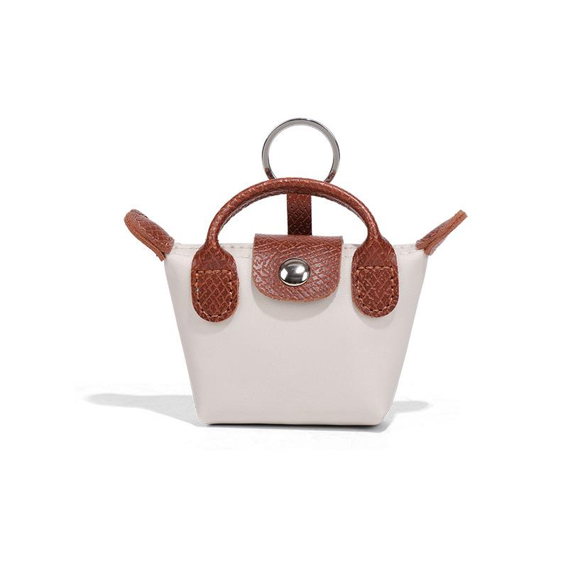 

Стильная и простая сумка-пельмень супер мини легкая французская сумка для мелочи наушники помада кошелек ключи маленькая подвесная сумка мини