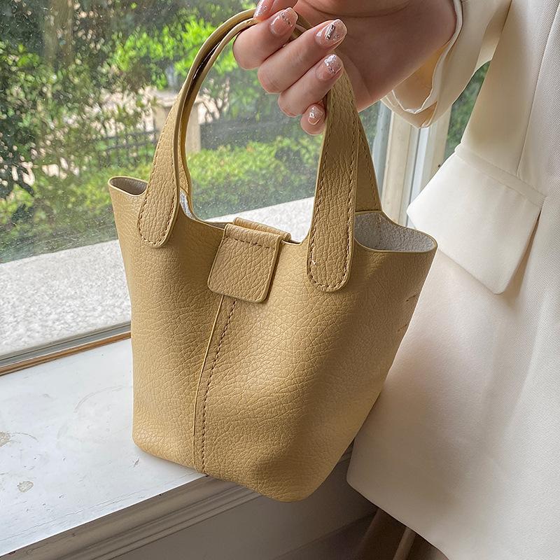 Vegetable basket women s bag 2 new trendy fashion hand carry lychee pattern soft leather portable small bucket bag female messenger Standard жёлтый