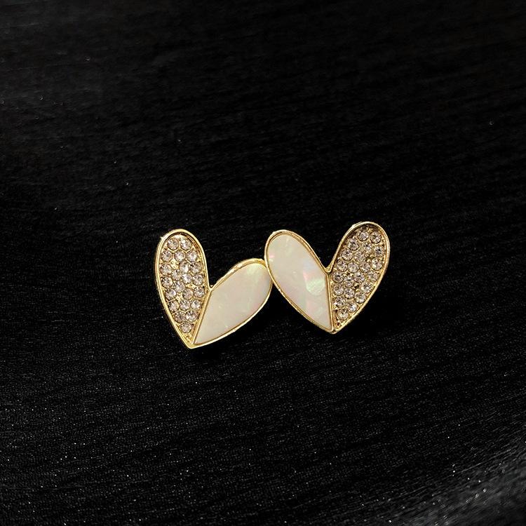 Temperament simple pearl love stud earrings women's light luxury niche design sense high sense Korean versatile earrings ear jewelry