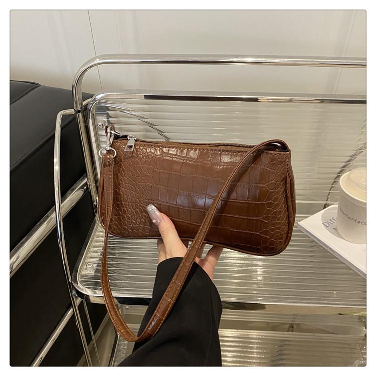 

2025 новая нишевая сумка женская ретро универсальная сумка подмышку метод палка сумка ручная сумка с крокодиловым узором сумочка