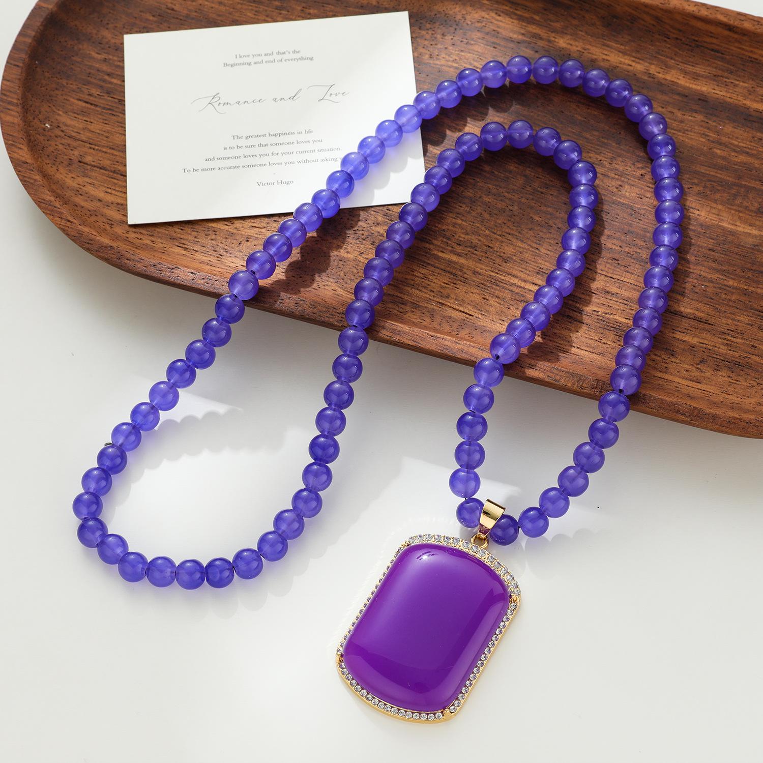 

Elegant Purple Necklace: Long Pendant Sweater Chain in Contemporary Chinese Style