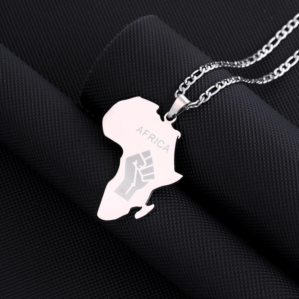 

Європейсько-американське титанове сталеве парне намисто з глянцевим золотим кулоном у вигляді африканської карти та кулака