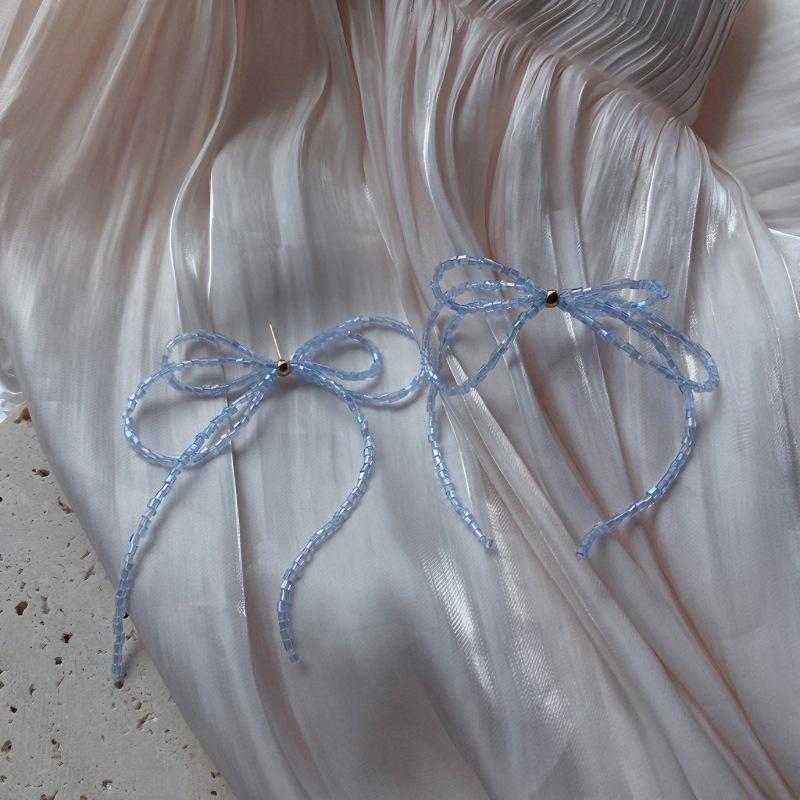 

Blue bow beaded tassel stud earrings, the same super fairy earrings, women s Korean fashion sweet earrings.