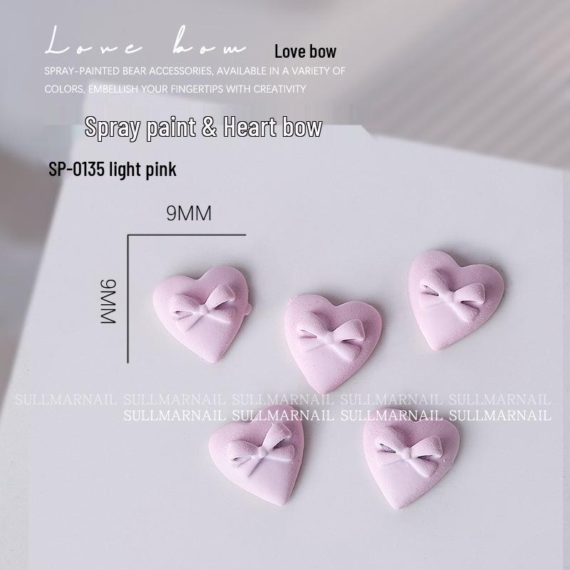 

Набор металлических 3D мультяшных украшений для ногтей в виде сердца и банта (5 кусков)